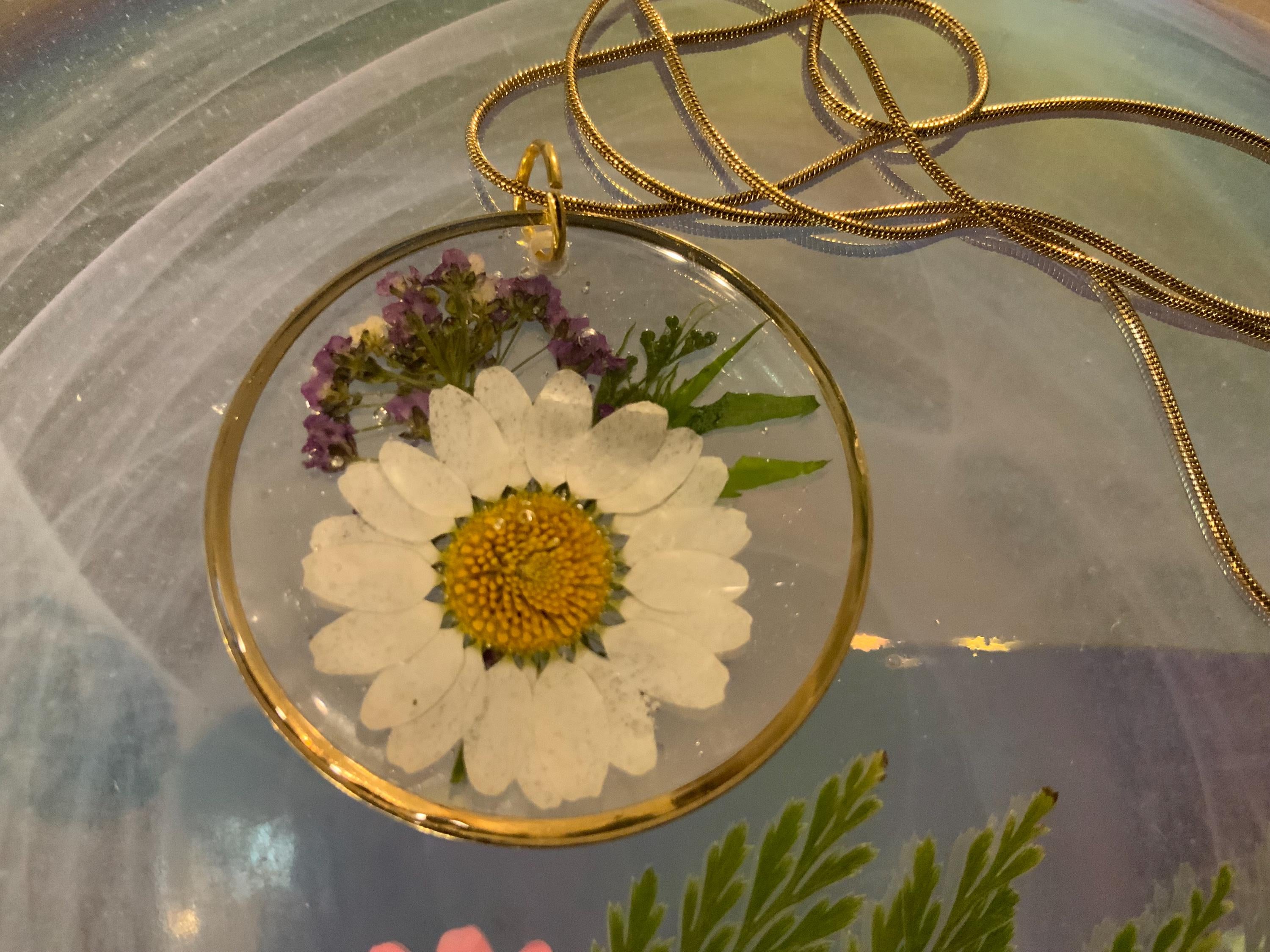 Daisy Round Pendant with purple accent flower