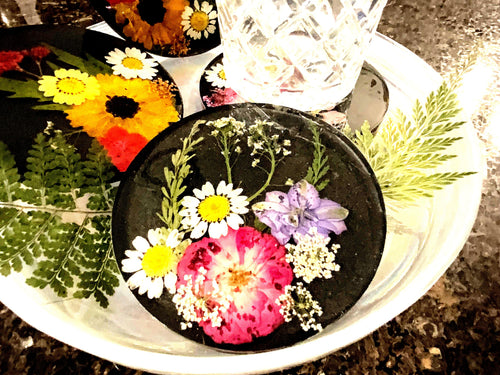 4 Piece black and pressed floral Coaster set
