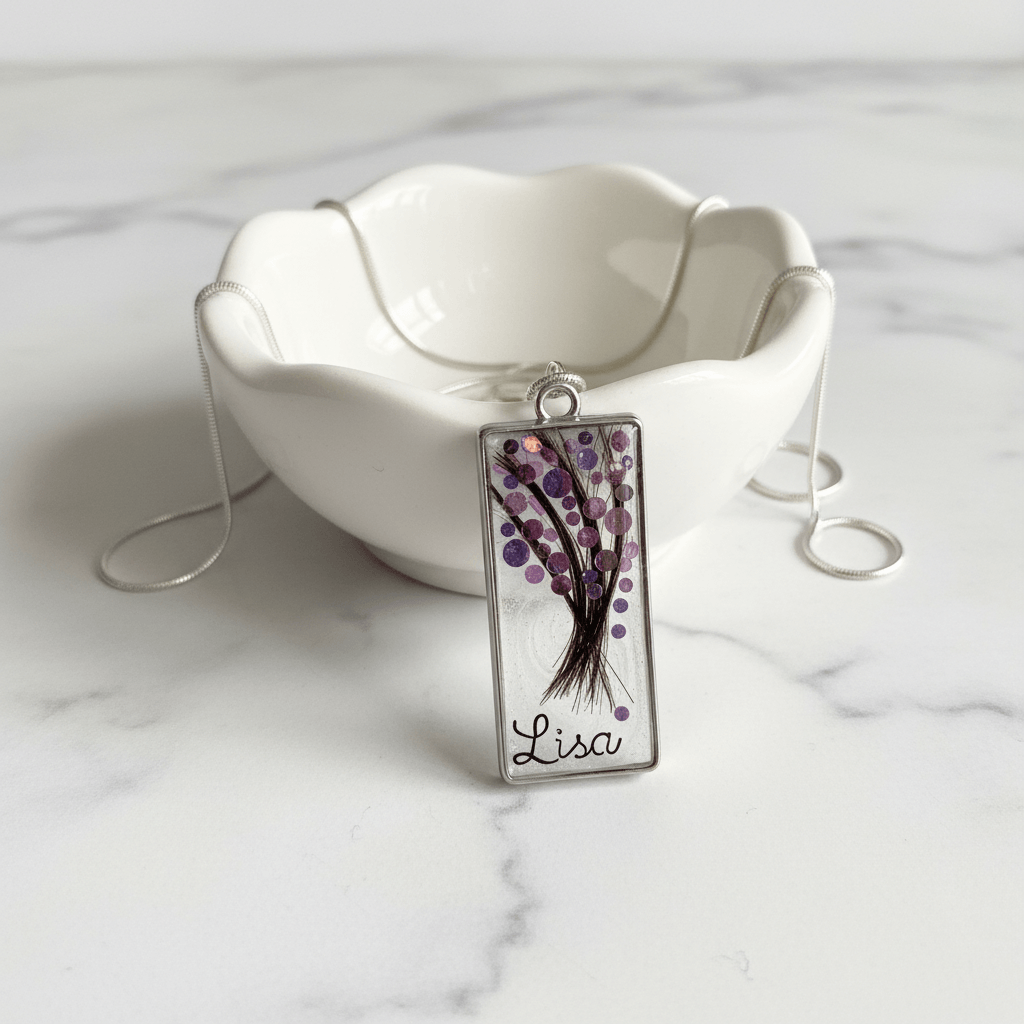 Forever Keepsake Hair Charm Draped Over Ring Bowl