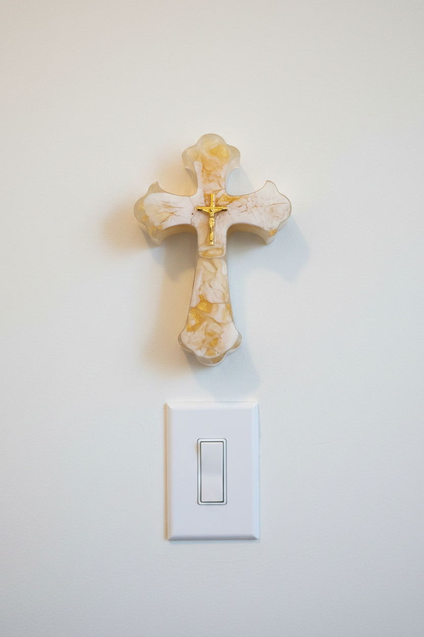 Gold Swirl Cross Hung Over Light Switch