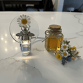 Handmade Resin LED Night Light – bee and daisy desigh with a jar of hony on marble counter top