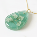 Jade Green Resin Teardrop Necklace – White Flower Pendant - The Glossy Gift Shop