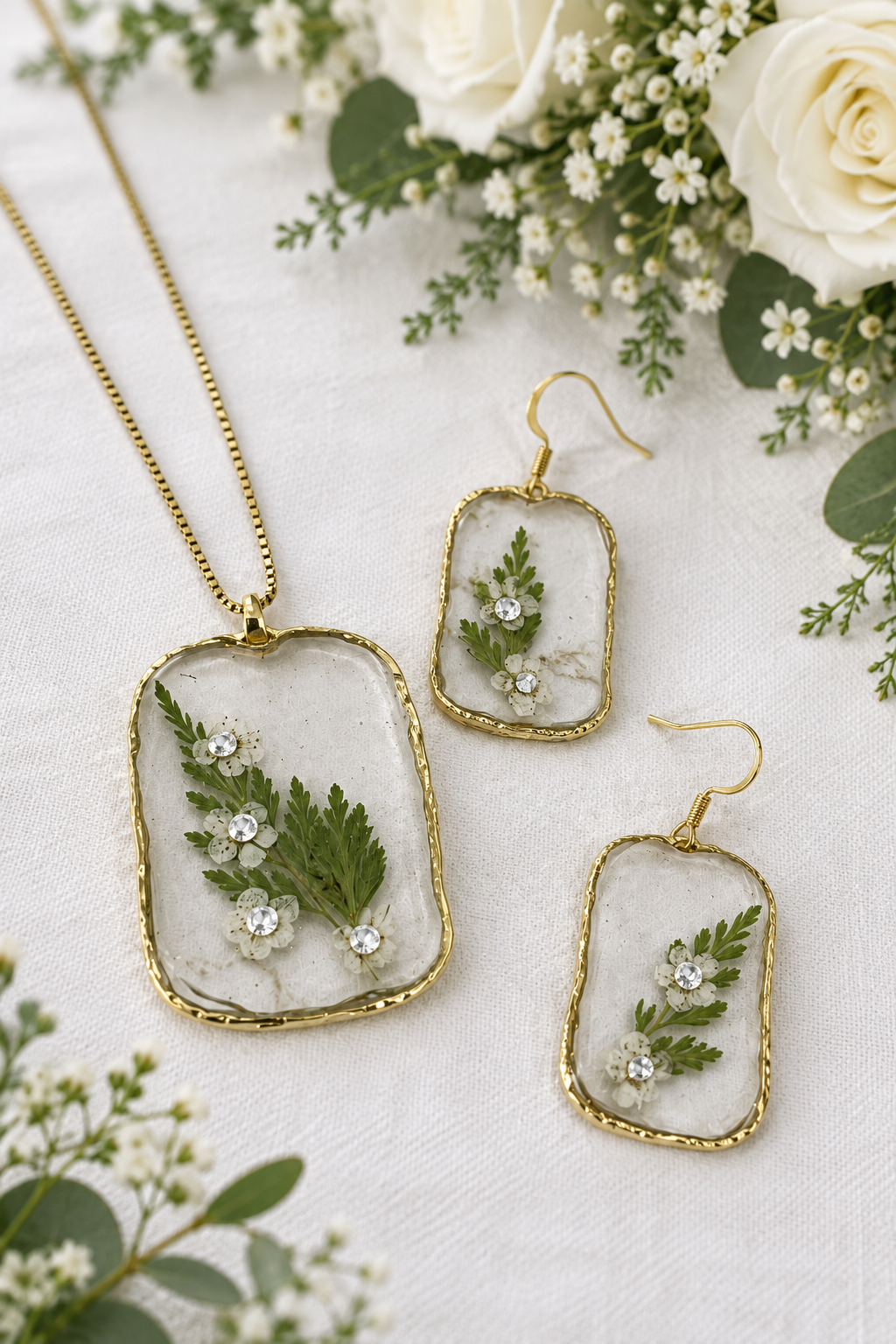 Jewelry set beside a bridal bouquet