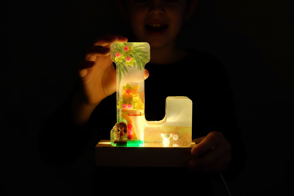 Moana Lighted Letter - Child Holding Glowing Letter