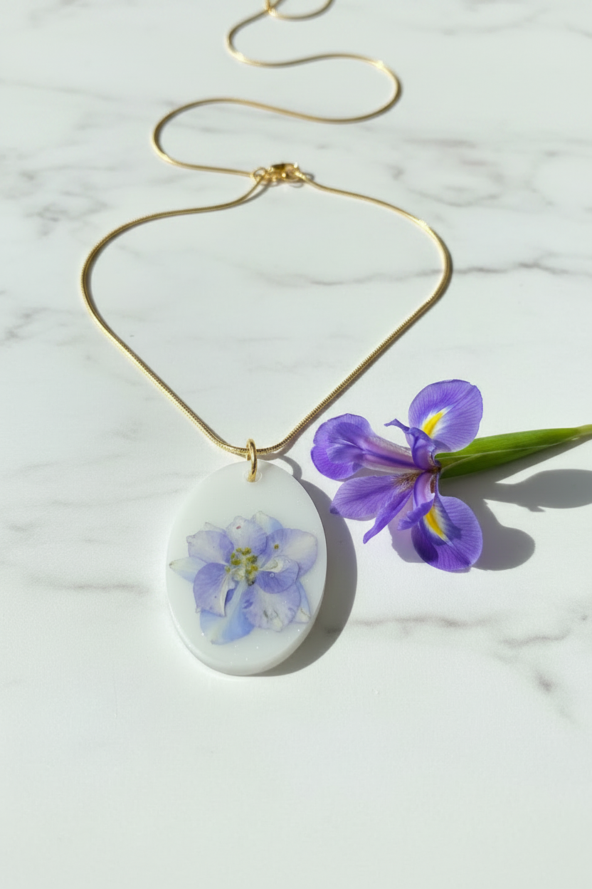 White Iris pendant on gold chain